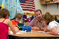 Teacher with young students 