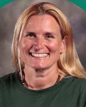Headshot of a smiling Kristin Diki wearing a green top