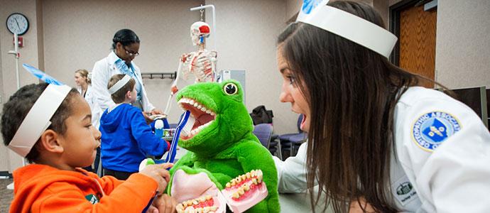 Student volunteering at Little People's Hospital