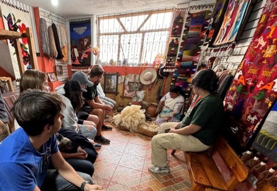 Students learn about local tourism and weaving in Ecuador