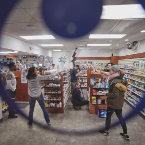 People standing in a pharmacy