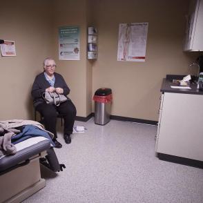 Elderly women sitting in a doctors office
