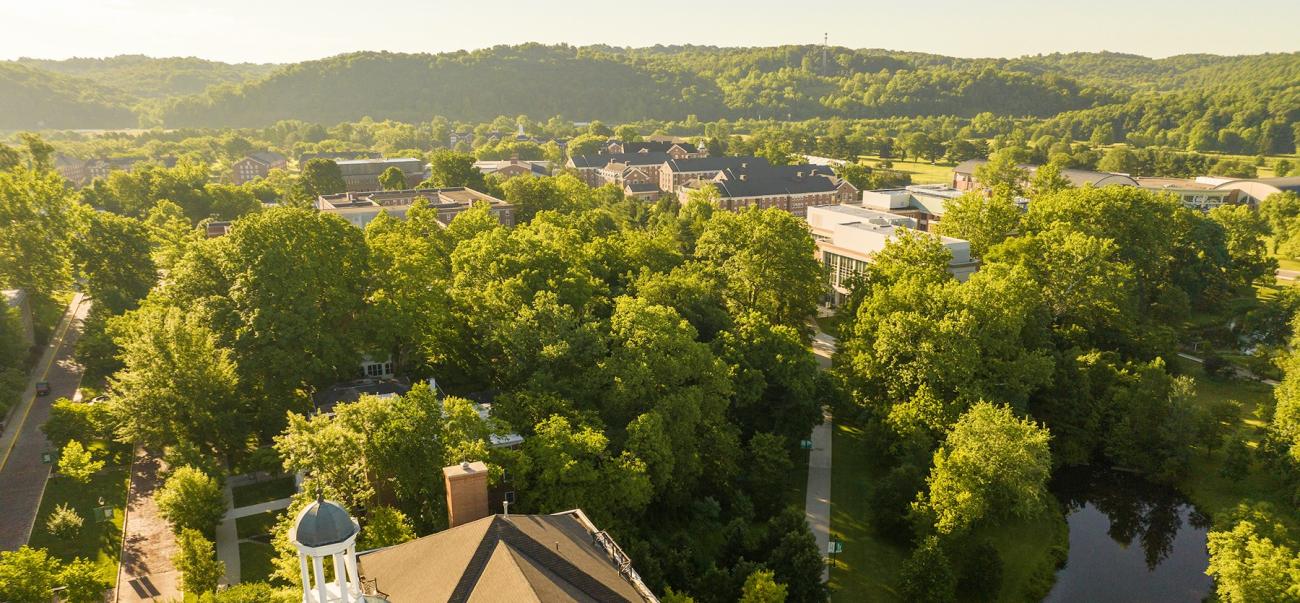 Aerial view of Ohio University's Athens campus surrounded by trees