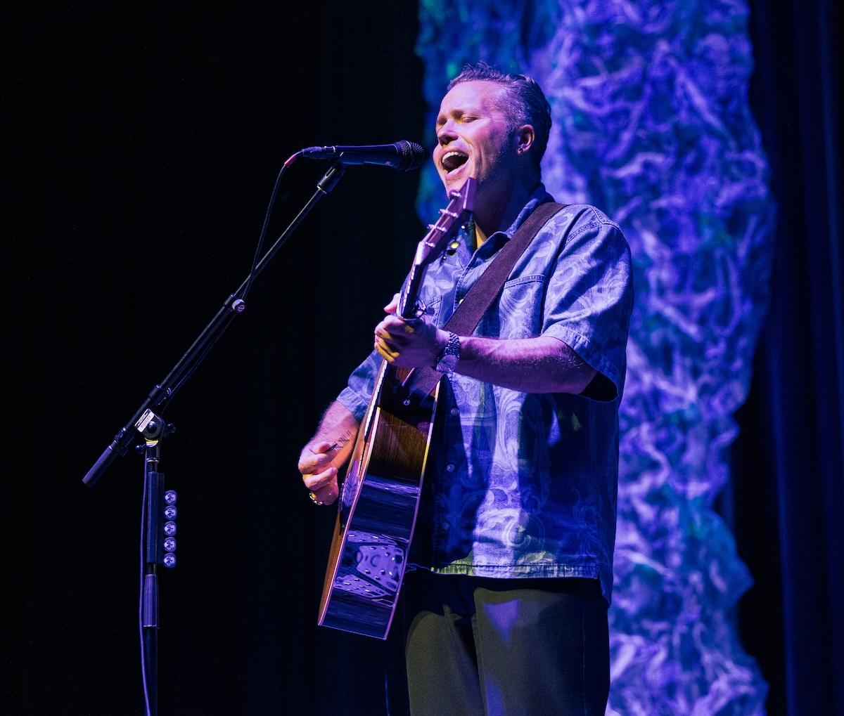 Jason Isbell singing and playing guitar