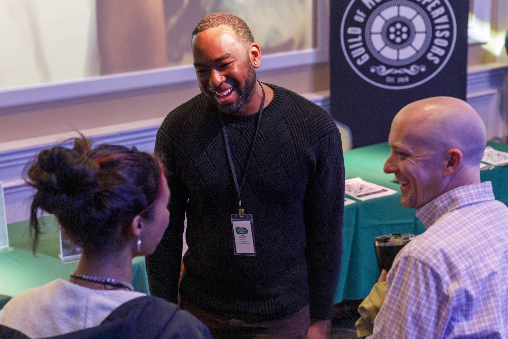 Dre Slater networking with attendees at Music Industry Summit