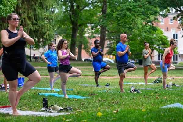 People do yoga outside at Ohio University