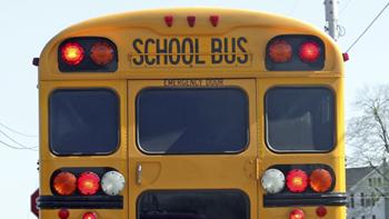 Rear of the school bus from the outside.