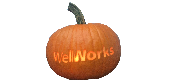 Pumpkin with WellWorks carved into it