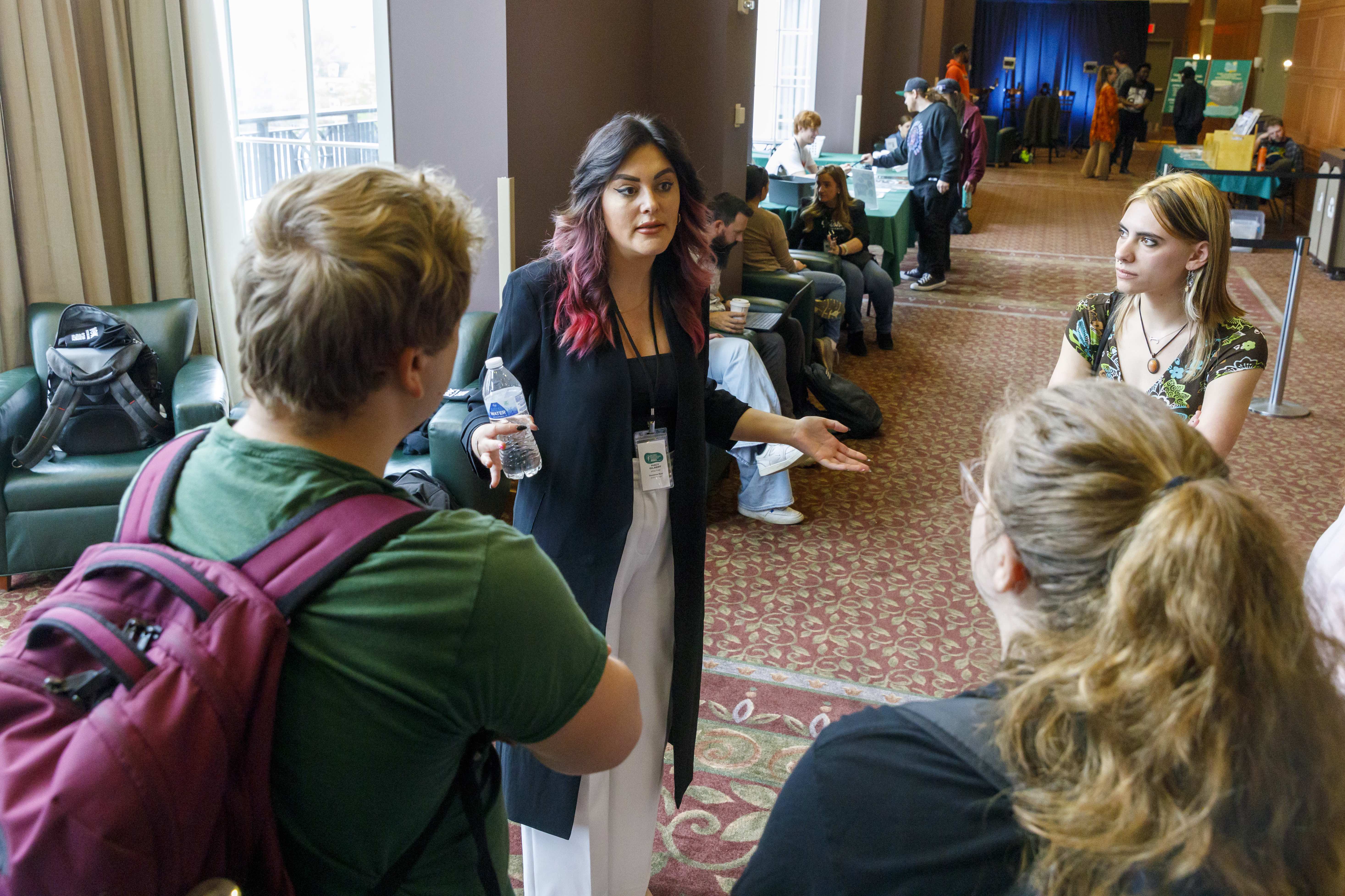Ohio University students seek advice from mentor and speaker Macy Gilbert.