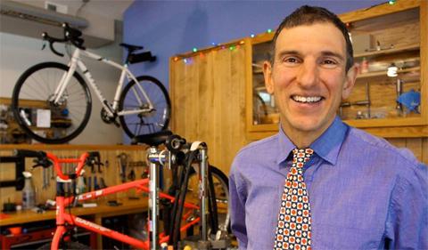 Peter Kotses standing in the Athens Bicycle shop