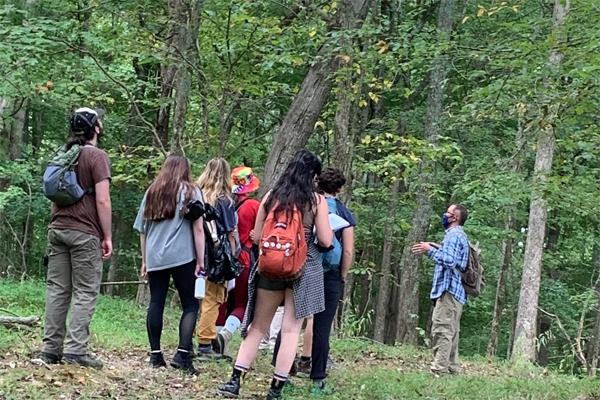 Professor Harvey Ballard is shown leading a nature discussion 