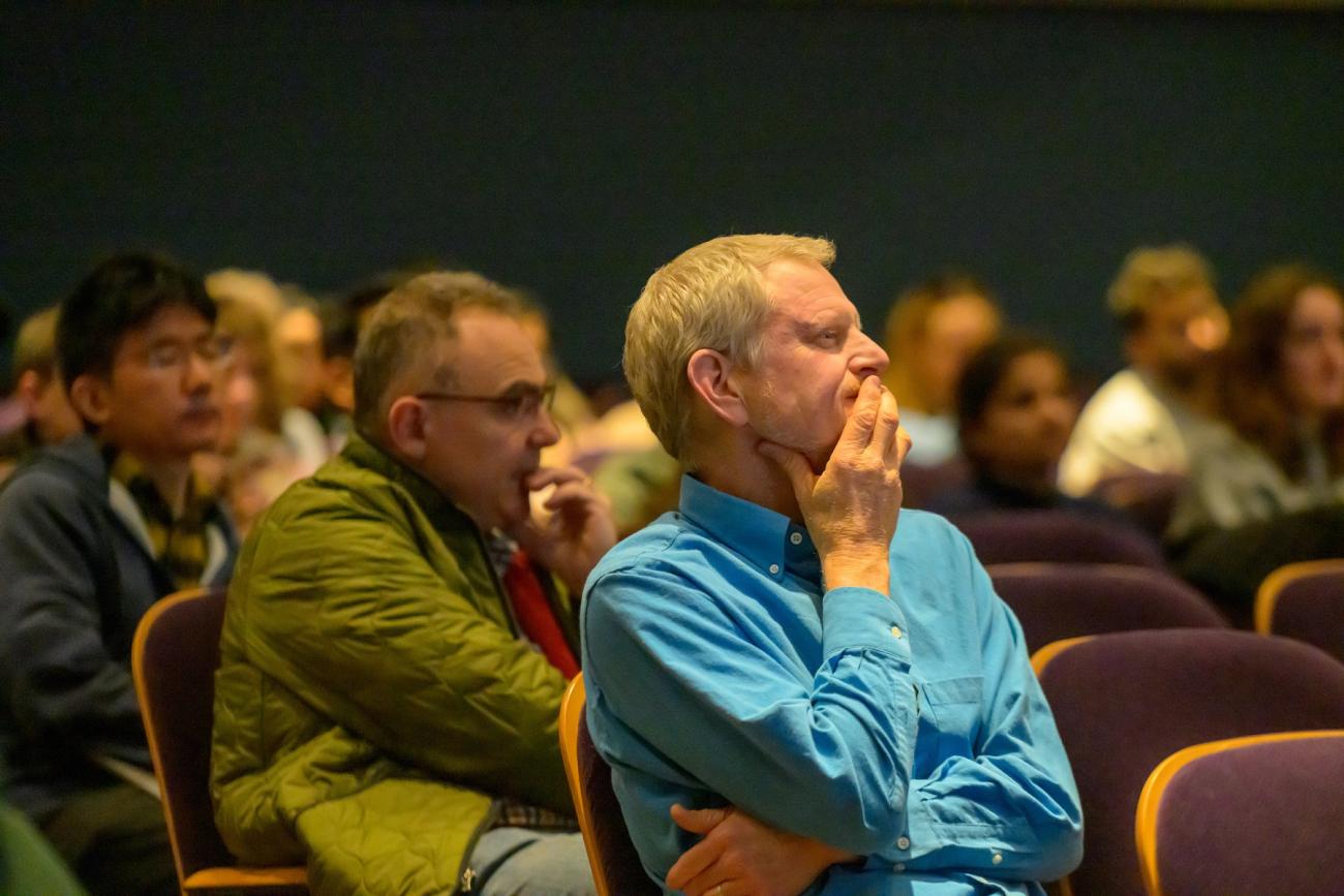 Audience members listen to the presentation by David Walt, Ph.D.