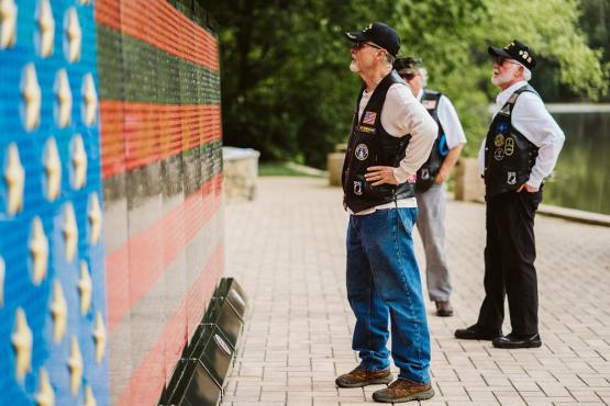 Veterans look at over the VAU Fallen Heroes Memorial