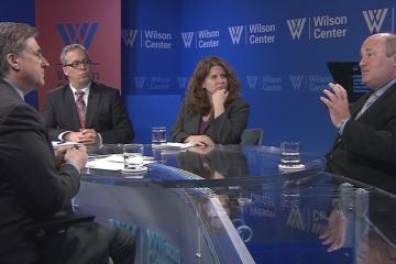 Four instructors sitting inside of Wilson Center