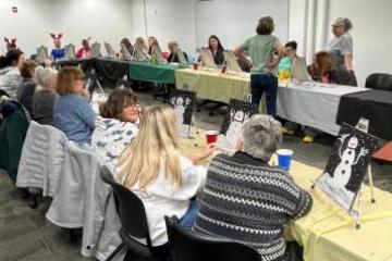 Participants in a community painting class