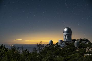 The Mayall 4-Meter Telescope, home to the Dark Energy Spectroscopic Instrument (DESI), seen at night at Kitt Peak National Observatory on Monday, May 21, 2018, in Tucson, Arizona. 05/21/18| 