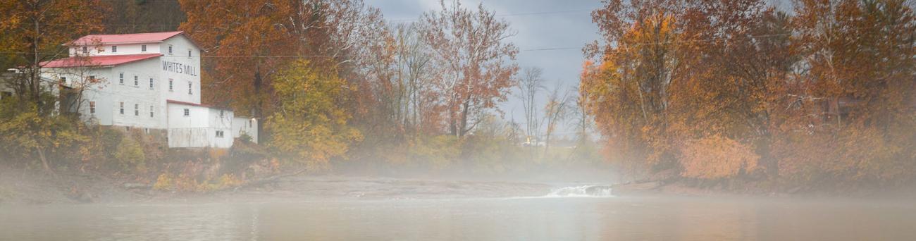 A view of the Hocking River and White's Mill on a foggy morning.