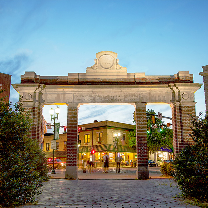 College Gateway at night