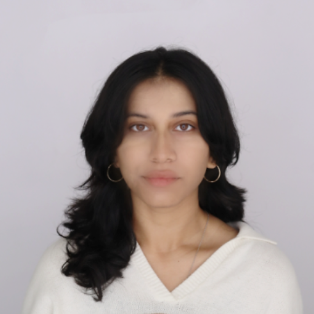 Headshot of Global Ambassador Ayesha Akbar against a white background.