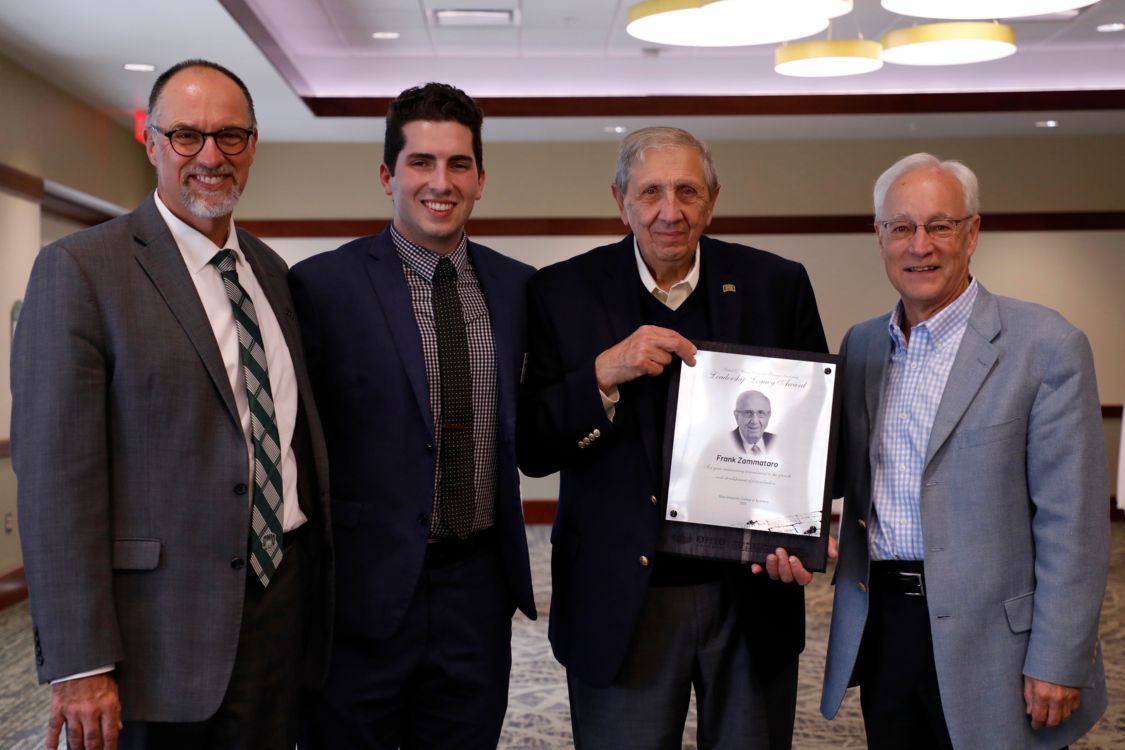 Frank Zammataro receiving Legacy Award from Tim Reynolds, Hugh Sherman, and Sam Glasser