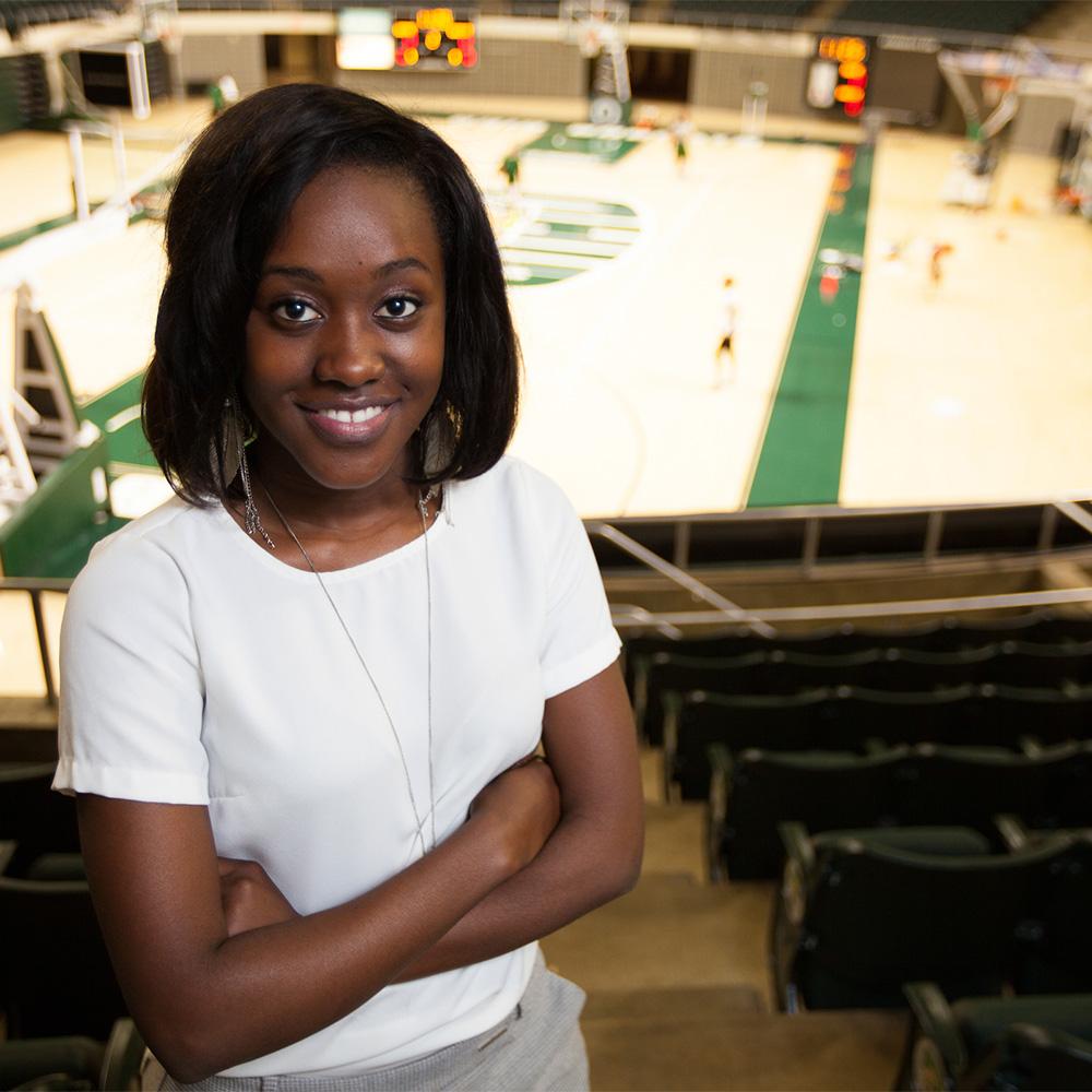 Brianna Reid poses for a photo in the Convocation Center.