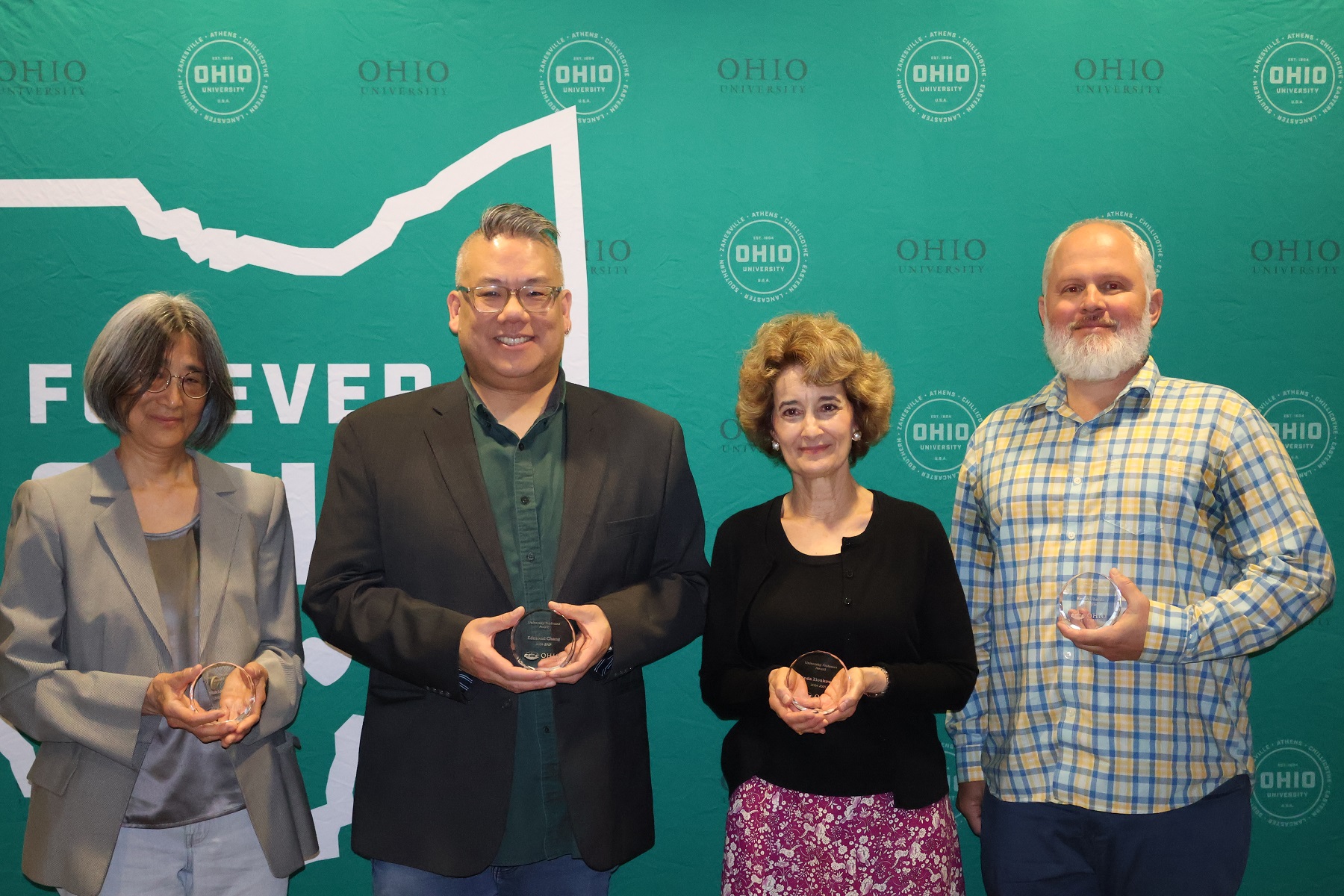 Photo of four winners of the 2023-24 University Professor Awards