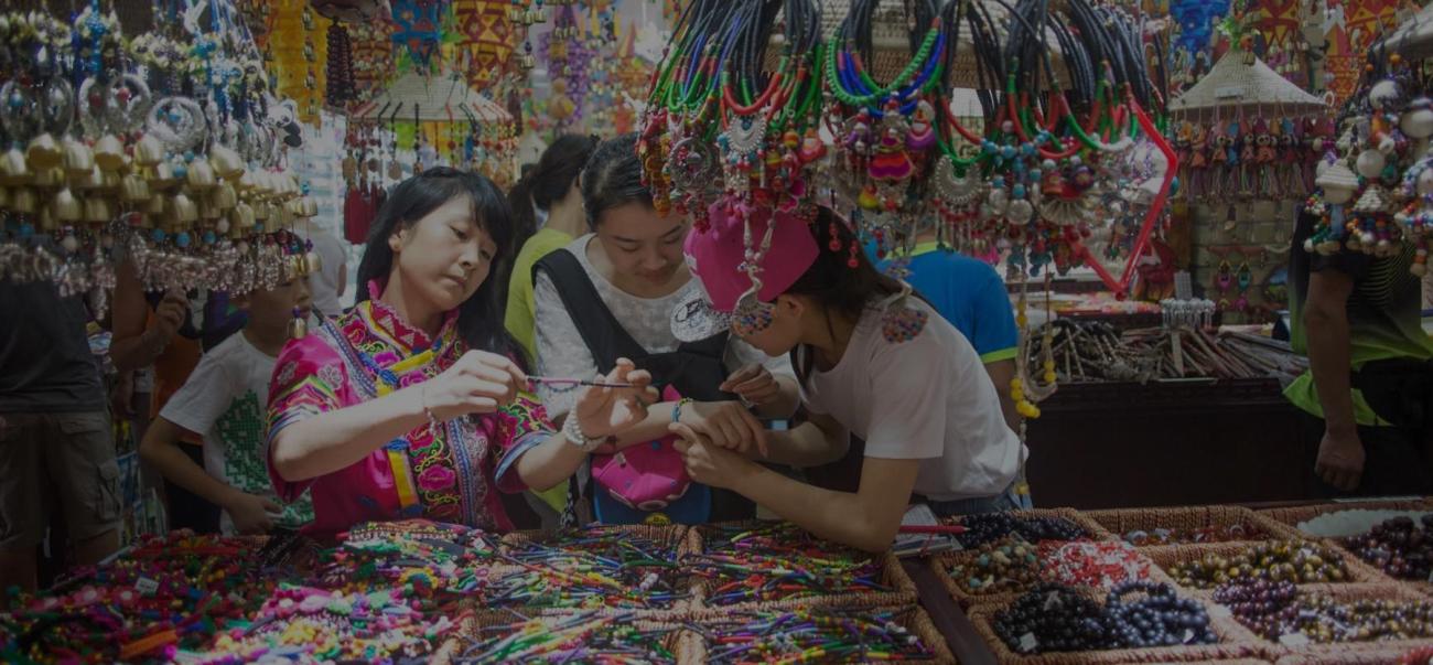 Jewelry makers in an Asian shop