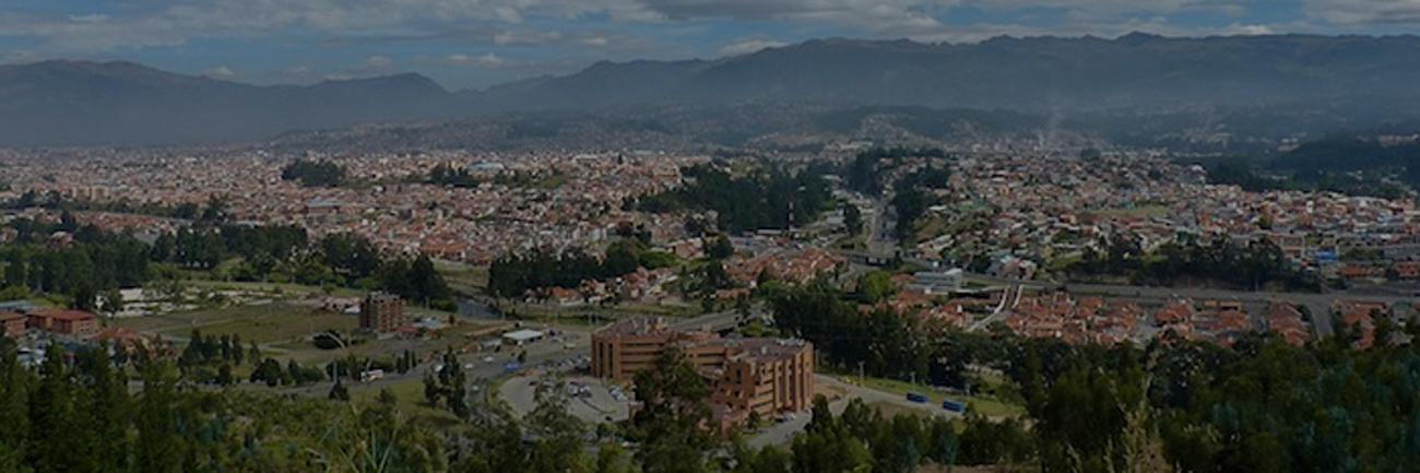 View of a city with mountains in the background