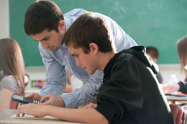 Students working with calculator