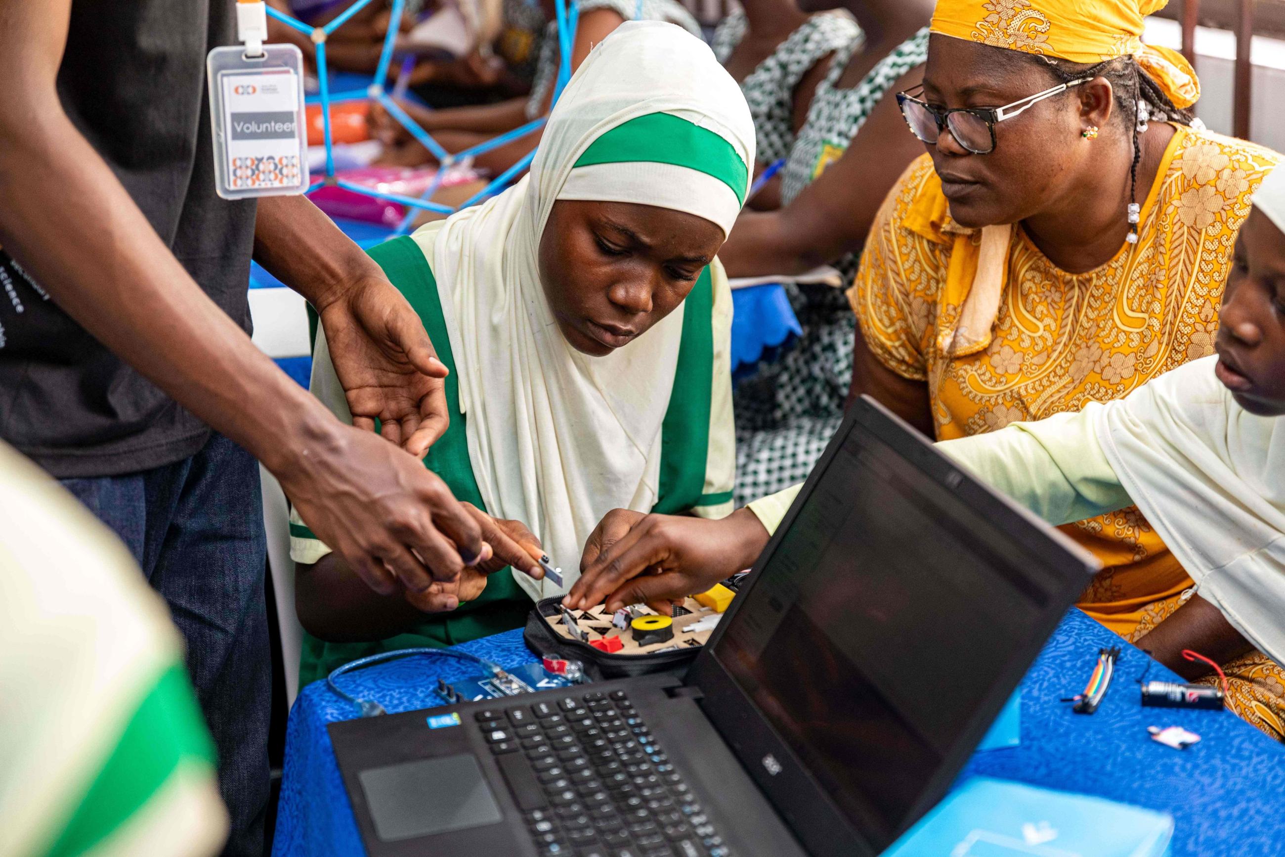 Young female student participates in activity in Ghana