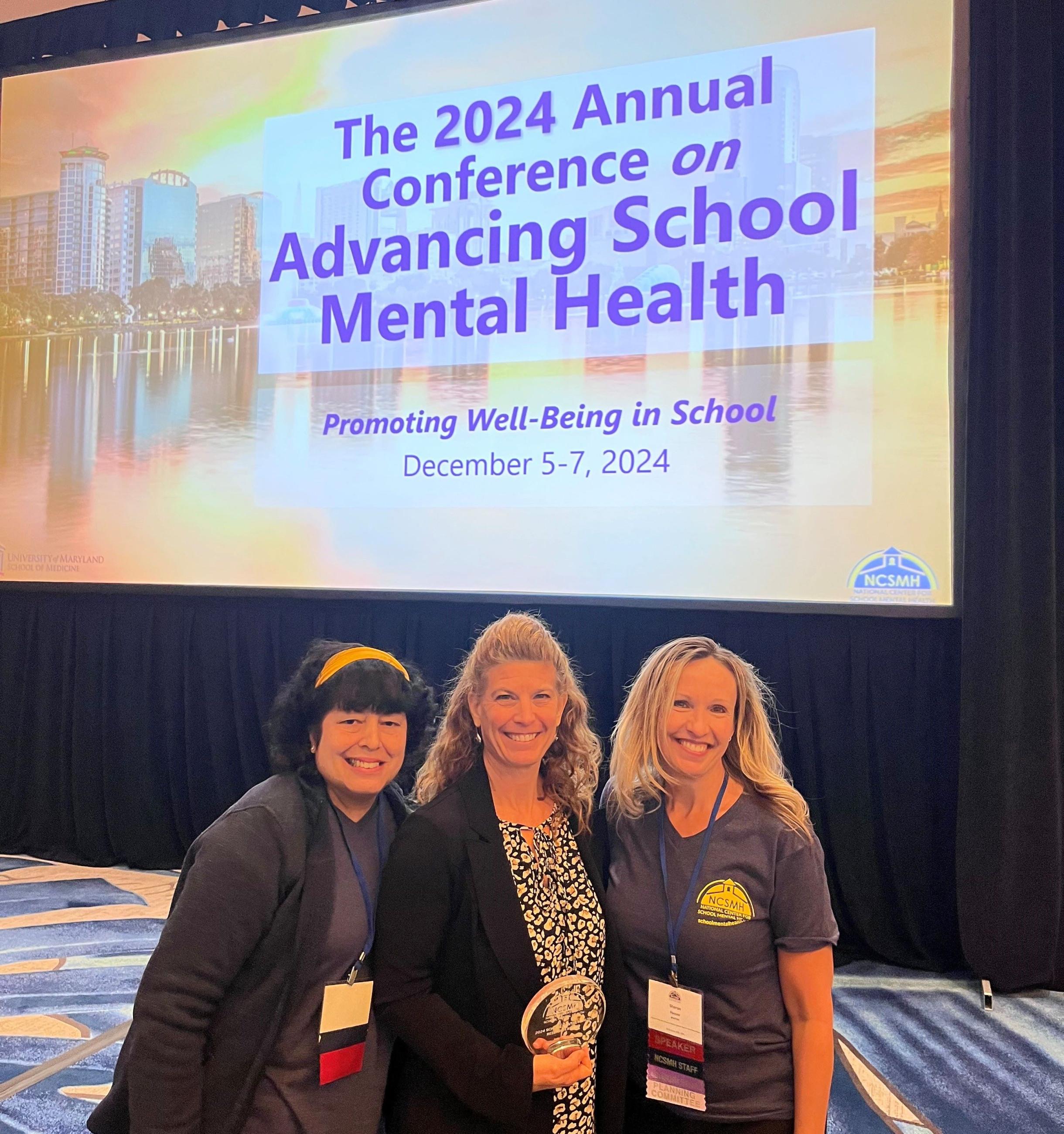 Dr. Julie Owens accepting the 2024 School Mental Health Research Award at the School Mental Health Conference in Orlando.