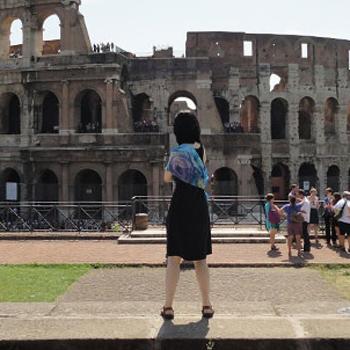 OHIO student in front of ancient ruins