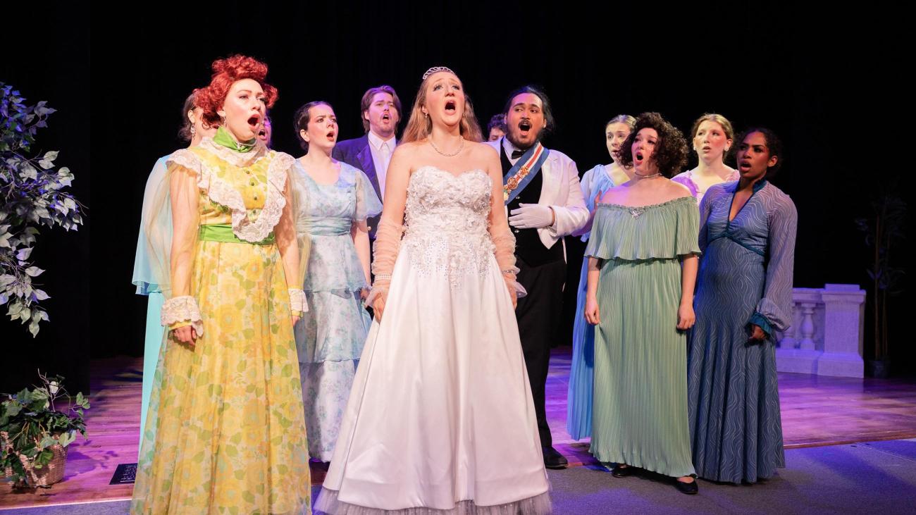 Ohio University Opera Theater production photo from Viardot's Cendrillon. Party Scene with women in gowns and men in tuxedos