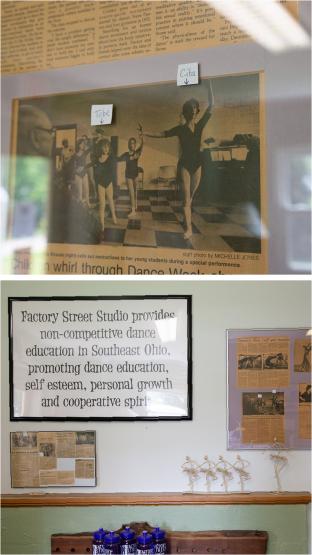 Newspaper clippings and historical ephemera adorn the studio walls of Factory Street Studios in Athens.
