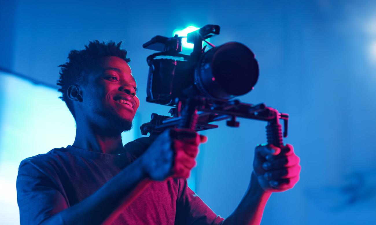 Student videographer in studio