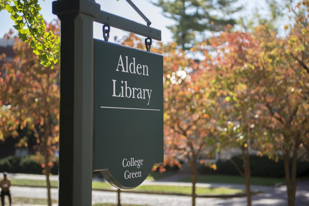 Alden Library sign outside of the library
