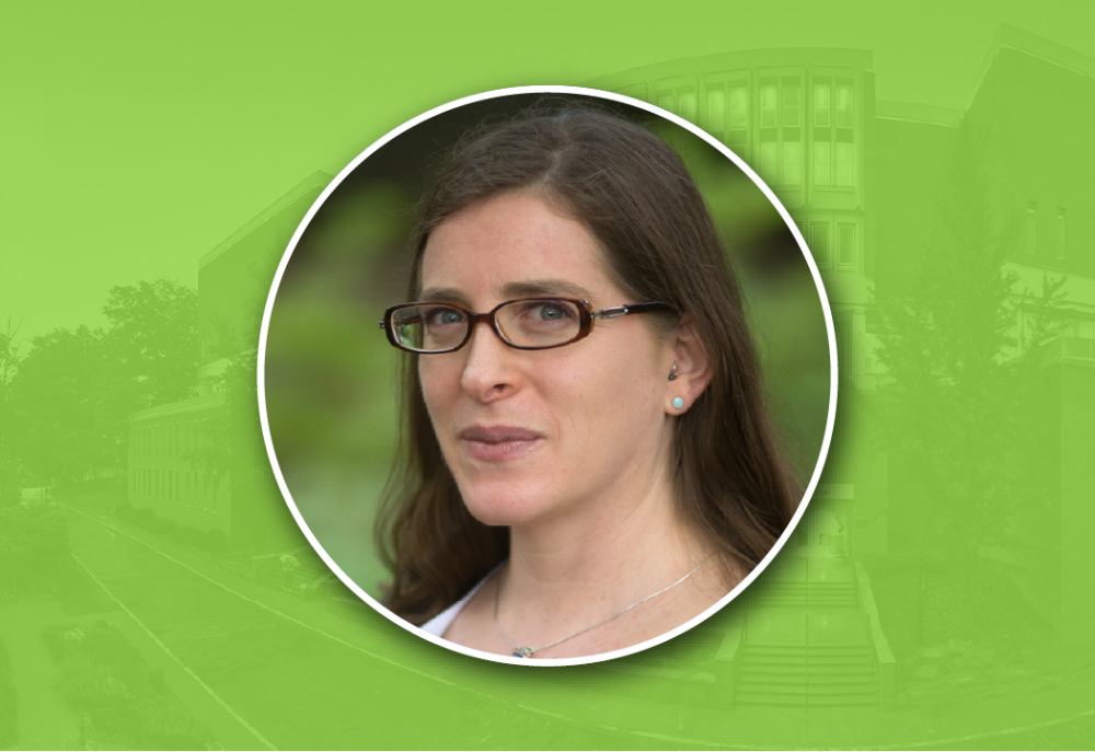 Portrait headshot of Miriam Intrator over a green background