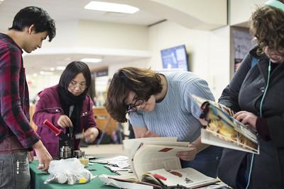 Students making buttons