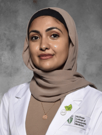 head shot of Noor Al-Hashemi in white coat