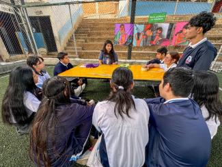 Ariel Cevallos, student at Ohio University, presenting one of the modules of the Rurankapak methodology to a group of highschool students in Cariamanga, Ecuador