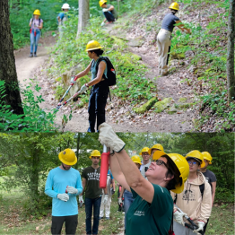 A group of Ecuadorian students volunteering at the Baileys Trail System, clearing the weeds from the path.