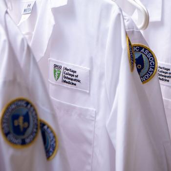 Closeup of a Heritage College of Osteopathic Medicine whitecoat