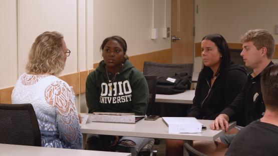 Sugar Bush Foundation President Hylie Voss talks with students about the various projects the field settings featured in their qualitative research methods course with Dr. Harter.