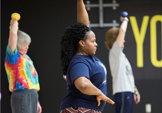 Participants doing an arm workout.