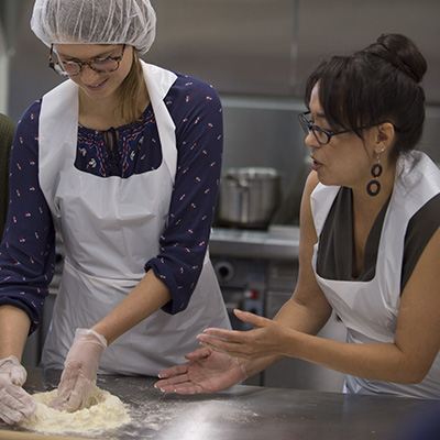 Students work together in a kitchen