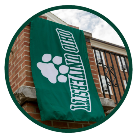 Green flag with Ohio University and paw print.