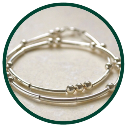 Silver bead bracelet.
