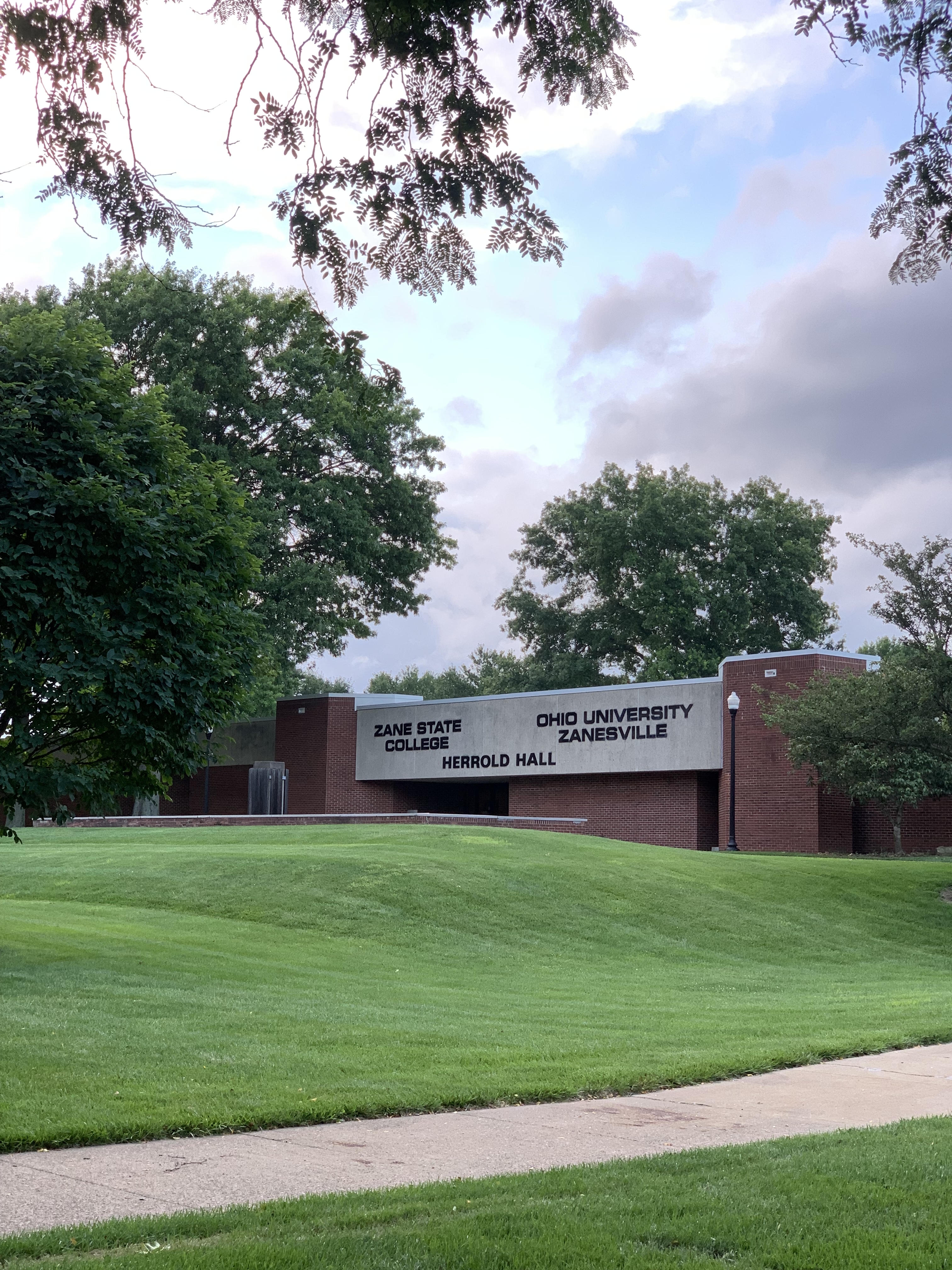 An image of Herrod Hall, a brick and stone building.