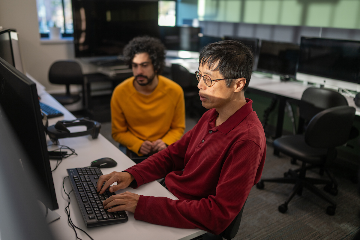 two students in computer lab