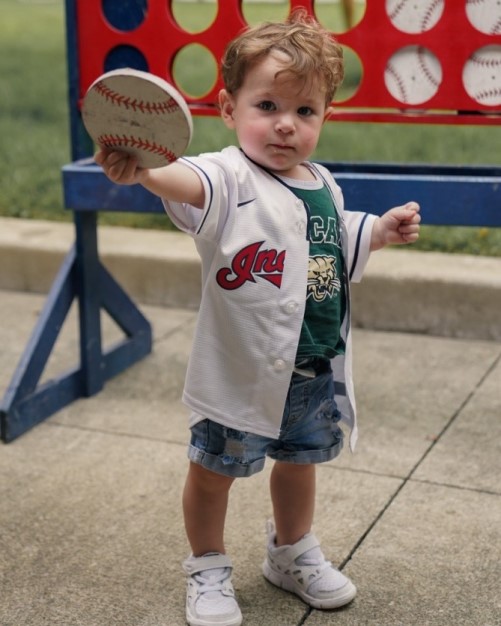 Little boy in OHIO and Guardians gear.